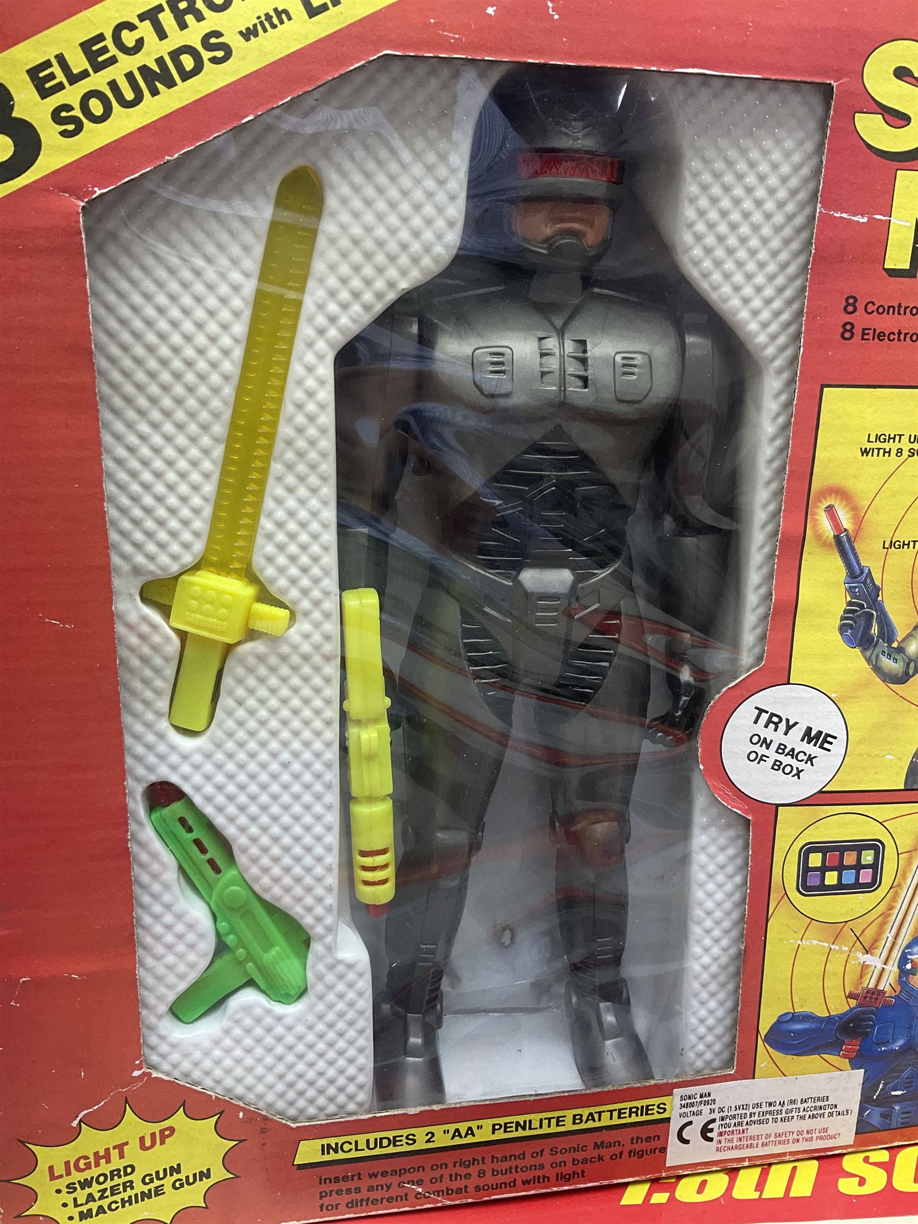 PMS Lightning 1:8 scale remote control racing car; Soma Sonic Man battery operated electronic sounds and light action figure; and CGL Galaxy Invader 10000 computer space battle game; all boxed (3)