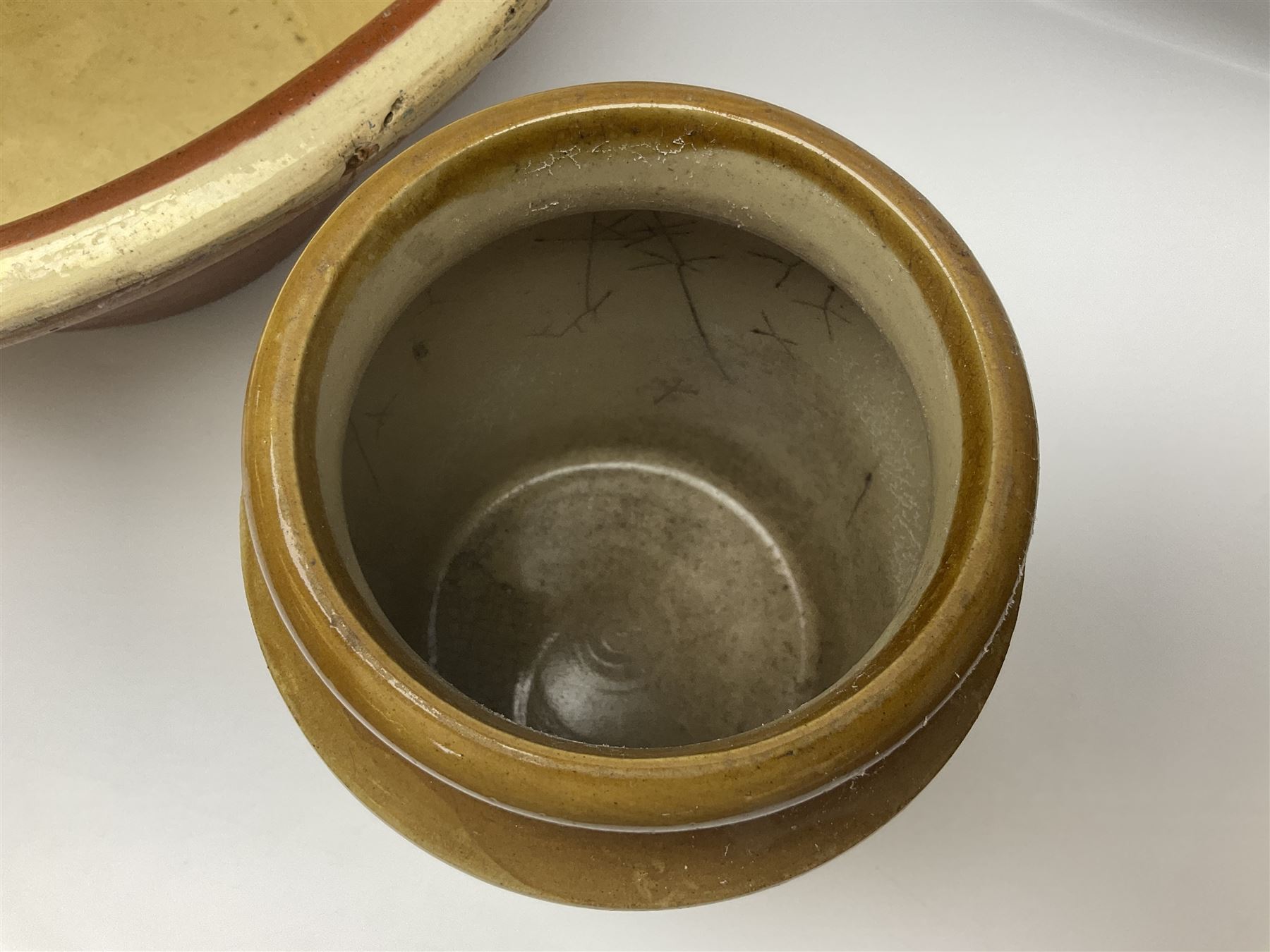 Terracotta bread proving bowl, together with three stoneware jars, tallest H26.5cm