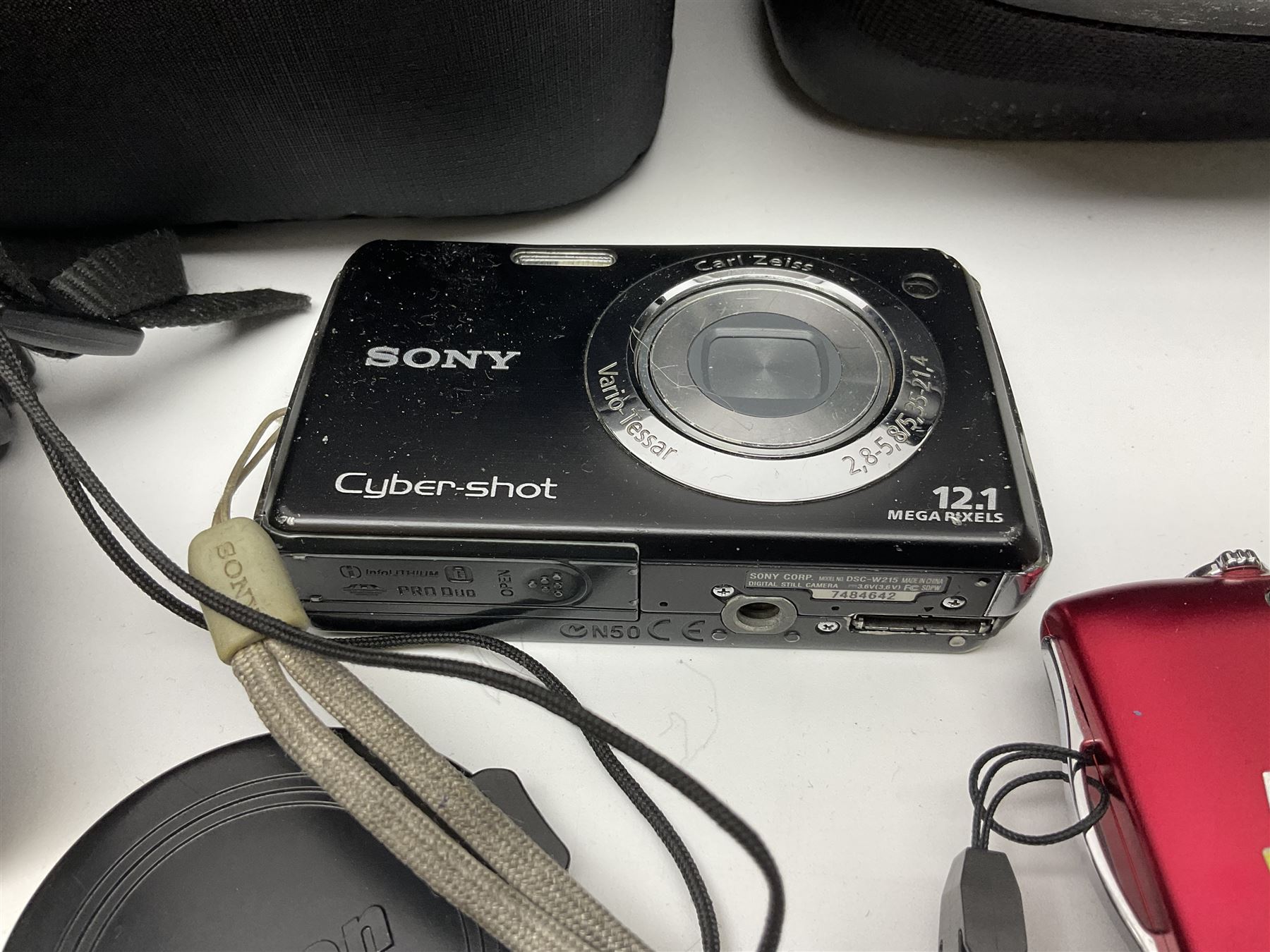 Nikon Coolpix 8700 camera body, serial no 3220838, with Zoom Nikkor Ed 8.9-71.2mm 1:2.8-4.2 lens, together with Canon digital video camcorder and other digital cameras and camera equipment