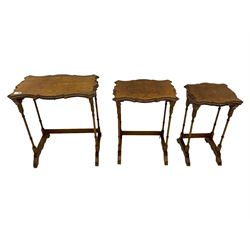 Late 19th century figured walnut nest of tables, shaped top