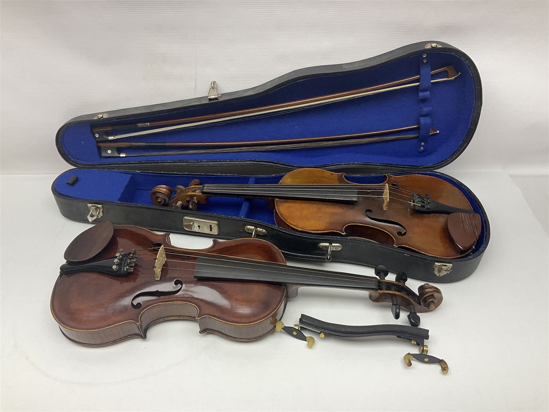 German trade violin in the Steiner style c1900 with 35.5cm two-piece maple back and ribs and spruce top L59cm overall; in fitted carrying case with two bows; and a Saxony violin with 35.5cm one-piece maple back and ribs and spruce top L58.5cm overall (2)