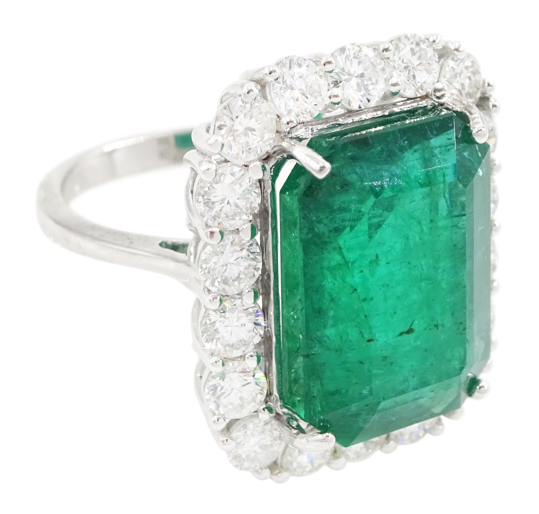 18ct white gold octagonal cut emerald and round brilliant cut diamond cluster ring, stamped, emerald approx 10.05 carat, total diamond weight approx 1.85 carat