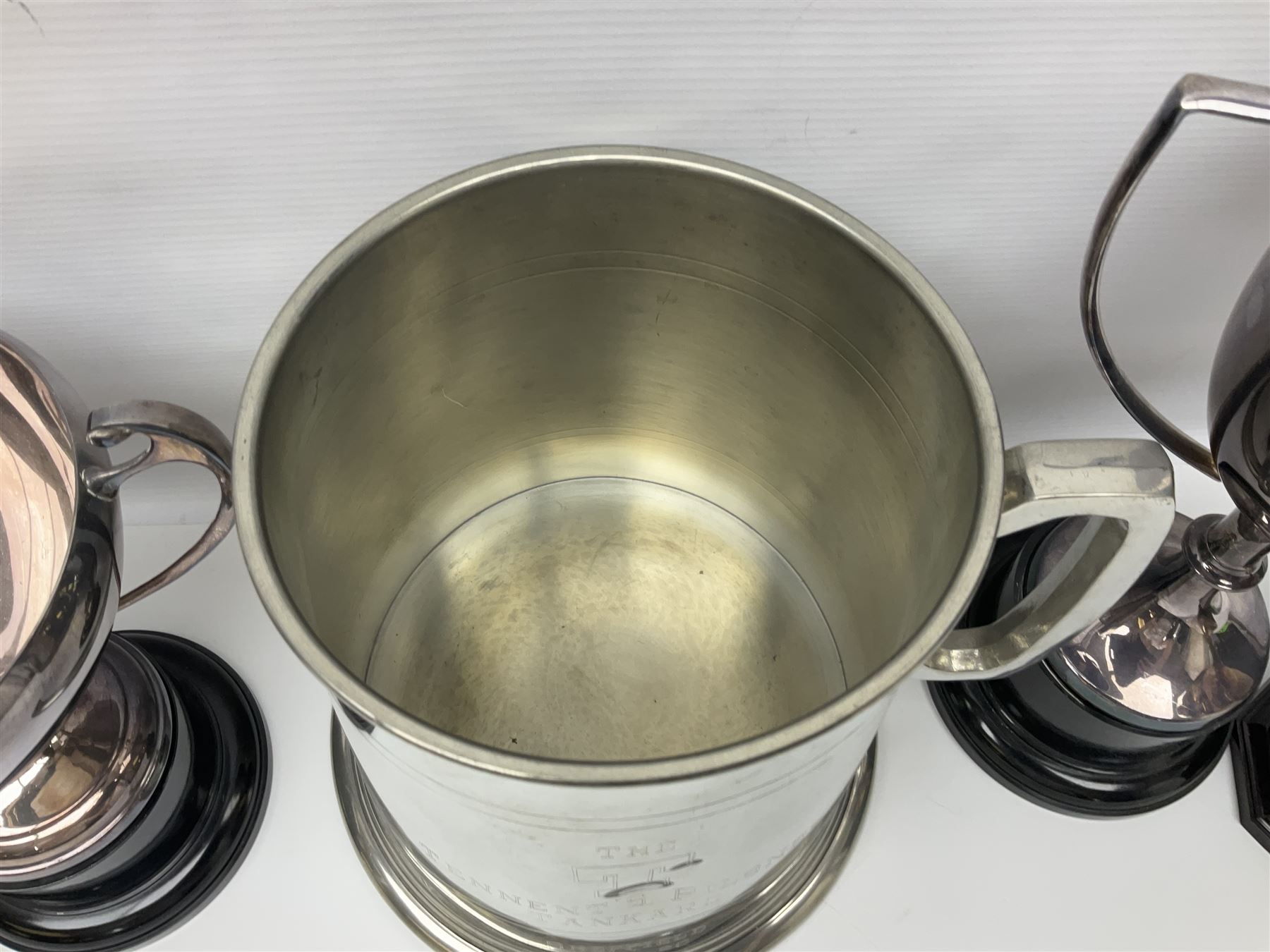 Collection of pewter and silver-plated trophy cups and presentation tankards, largest H28cm
