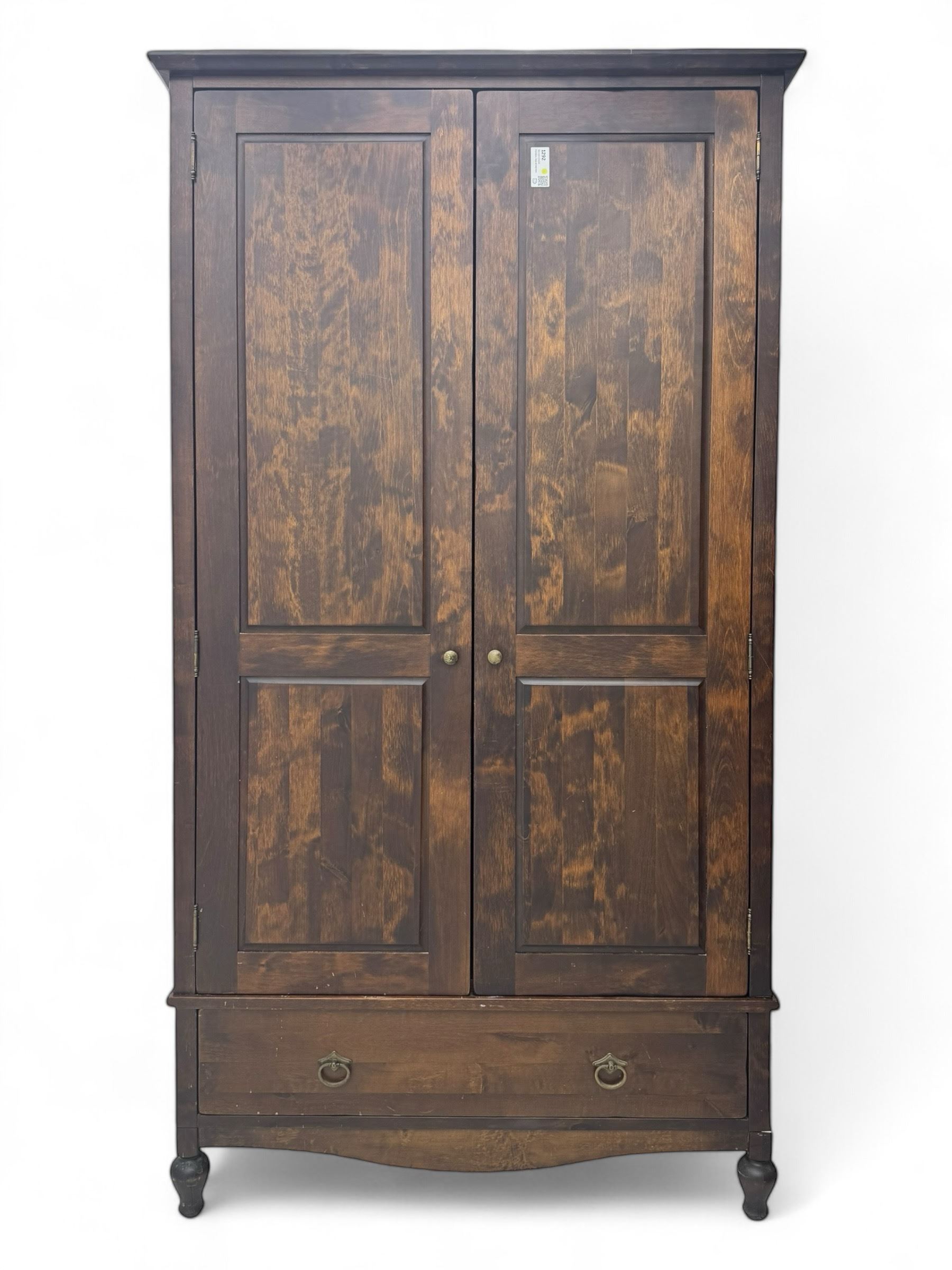 Marks & Spencer - dark wood double wardrobe, fitted with single drawer, on turned feet