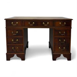 Contemporary mahogany pedestal desk, rectangular top inset with tooled and gilt bordered t...