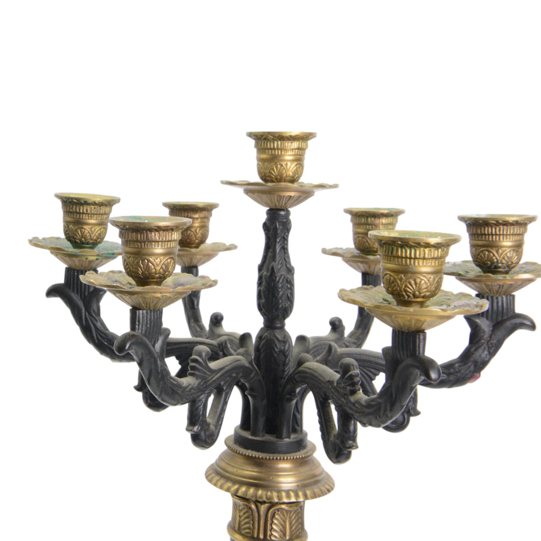 Pair of 20th century Corinthian column seven branch candelabra, with gilt brass sconces and swept acanthus leaf pedestal bases, H69cm (2)