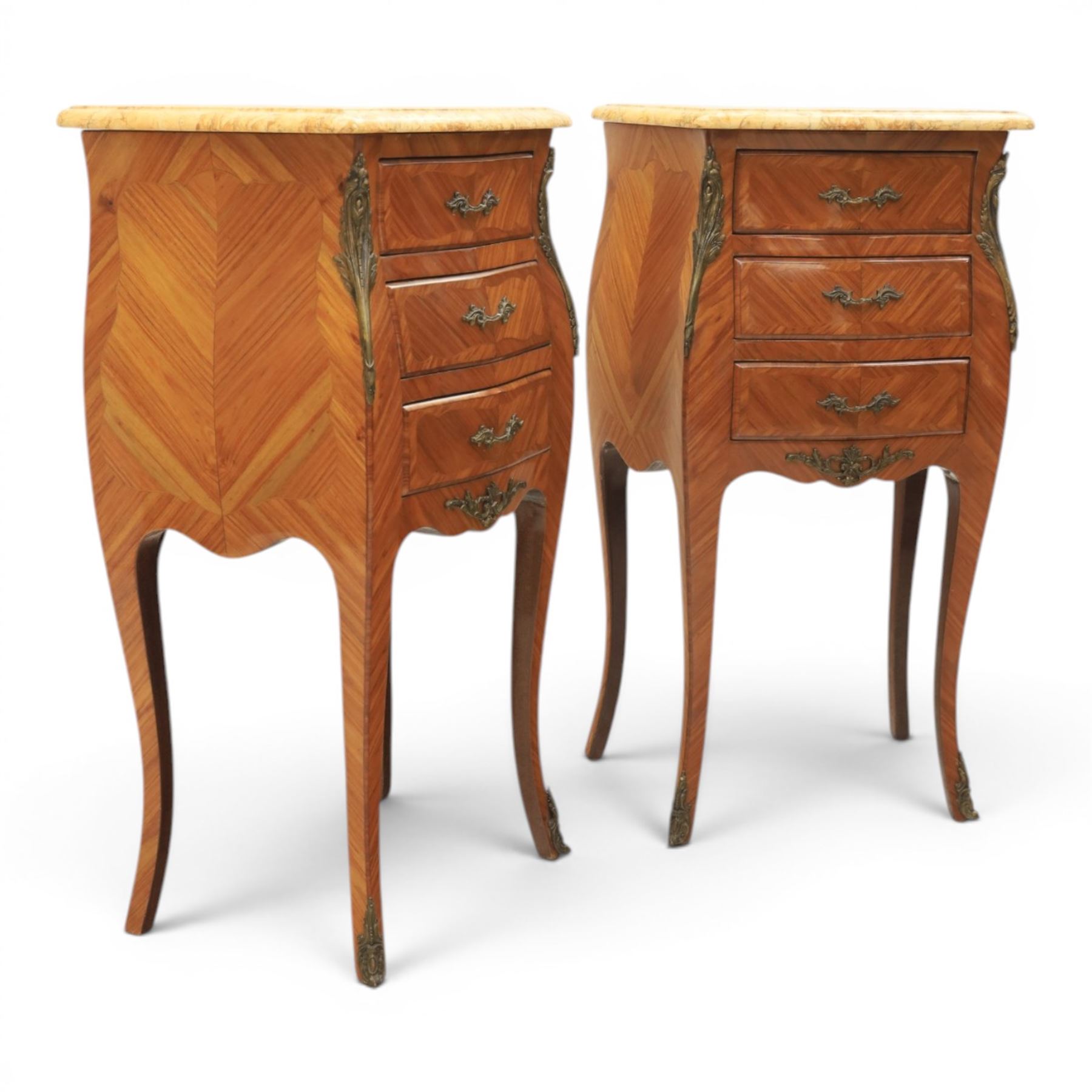 Louis XV style pair of kingwood and marquetry bedside chests, with shaped marbled tops, fitted with three drawers, with gilt metal mounts, raised on cabriole legs