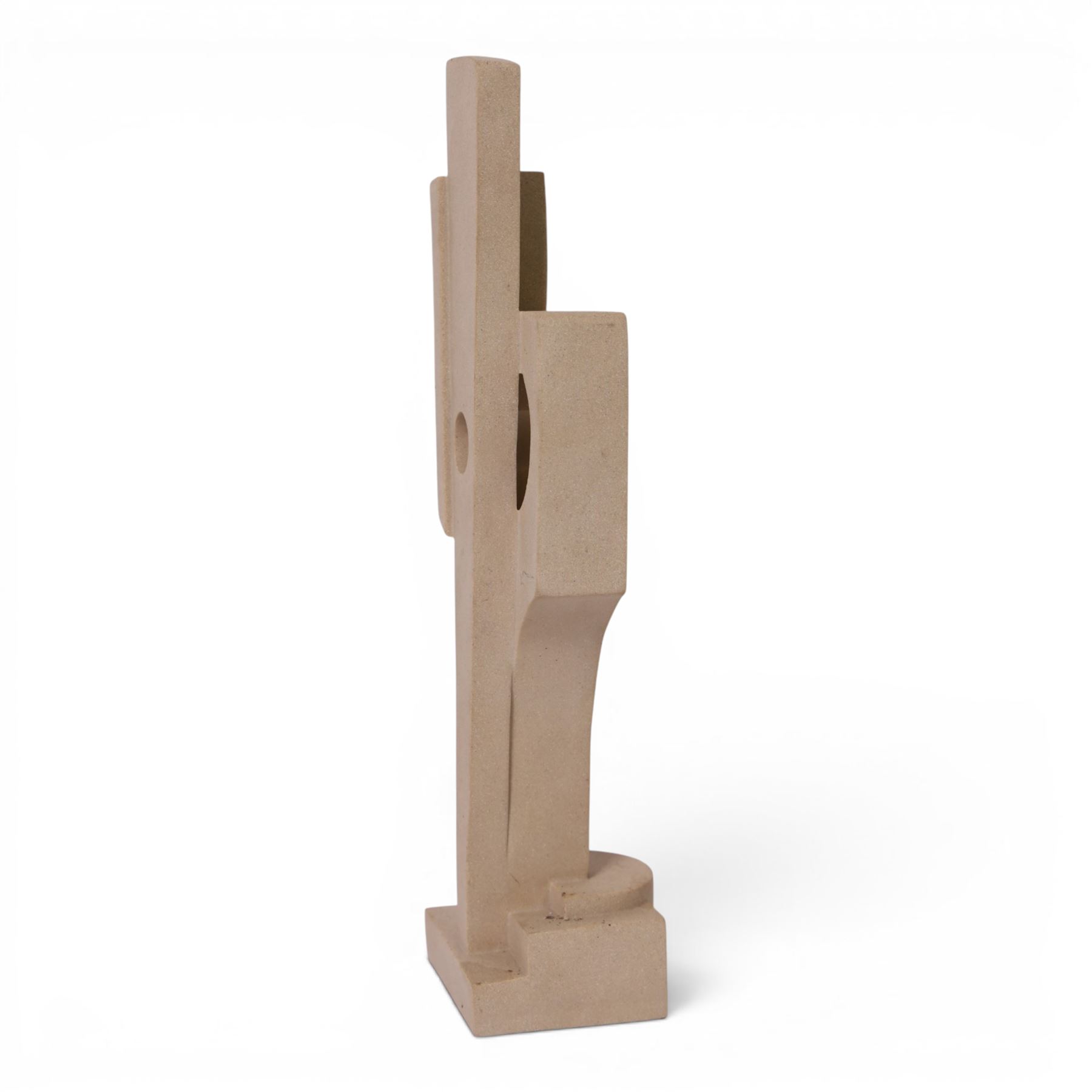Abrstact stone sculpture, of geometric shapes with a central circular gap, raised upon a stepped rectangular base, H36cm