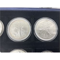Thirty-four United States of America one ounce fine silver coins, dated from 1986 to 2019 being a complete date run, housed in a collectors box