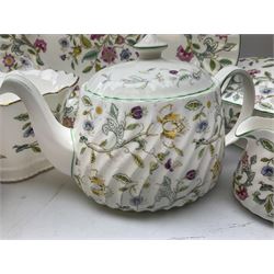 Minton Haddon Hall pattern tea and dinnerwares, to include two covered tureens, serving platter, teapot, milk jug, covered sucrier etc, (11) 