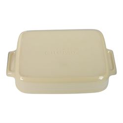 Le Creuset ceramic kitchen wares in cream and light blue, including pie dishes, baking dishes, petit casseroles etc  