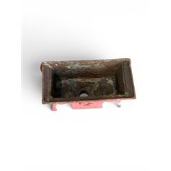 Edwardian heavy cast iron rainwater hopper, with water motif, painted in pale red finish