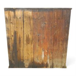 19th century painted and lacquered pine clerks desk bureau on cupboard, hinged fall-front enclosing three compartments, over slatted panelled doors enclosing two perforated shelves, on skirted base, in rustic forest green and red finish