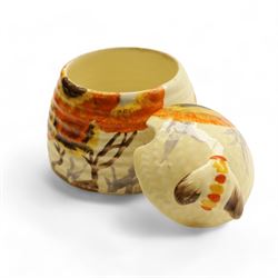 Clarice Cliff Bizarre for Wilkinson Ltd, small beehive honey pot with cover, in Rhodanthe pattern, with printed mark beneath, H7cm
