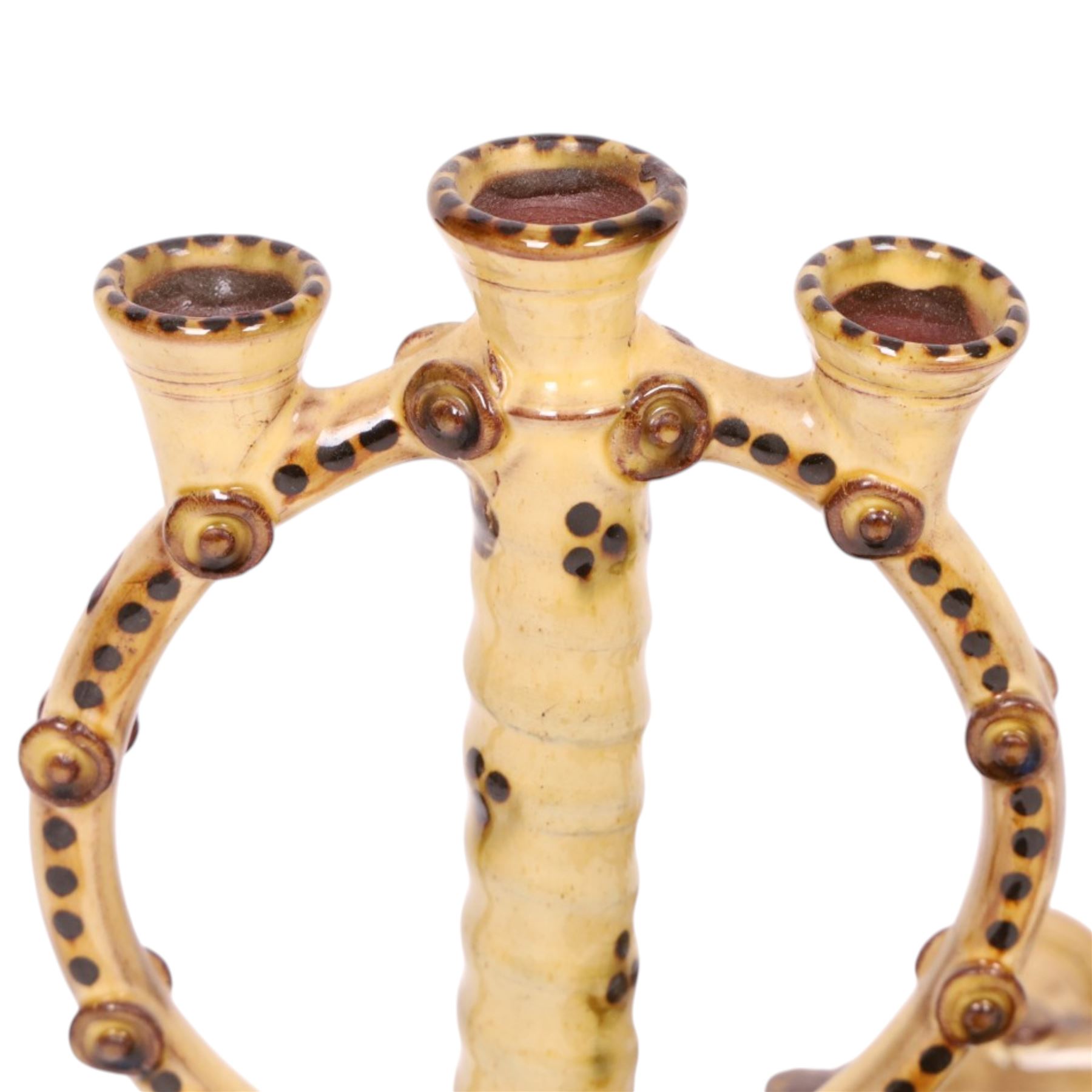 Pair of studio pottery candlesticks, with a central twisted column bordered by circular supports, H24cm 