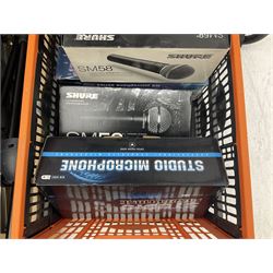 Two Shure SM58 microphones, Gatt Audio DM-700 microphone, other boxed and unboxed microphones and various microphone and music stands