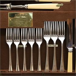 Canteen of plated Elkington Monarchy cutlery in mahogany table stand on cabriole legs W67cm