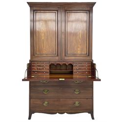 George III mahogany secretaire press, the projecting cornice over two panelled doors with reeded brass door slip enclosing two shelves, the secretaire fall front drawer with leather inset and a combination of small drawers and pigeon holes, three long drawers below, fitted with oval pressed brass plates and handles, shaped apron with splayed bracket feet
This item has been registered for sale under Section 10 of the APHA Ivory Act