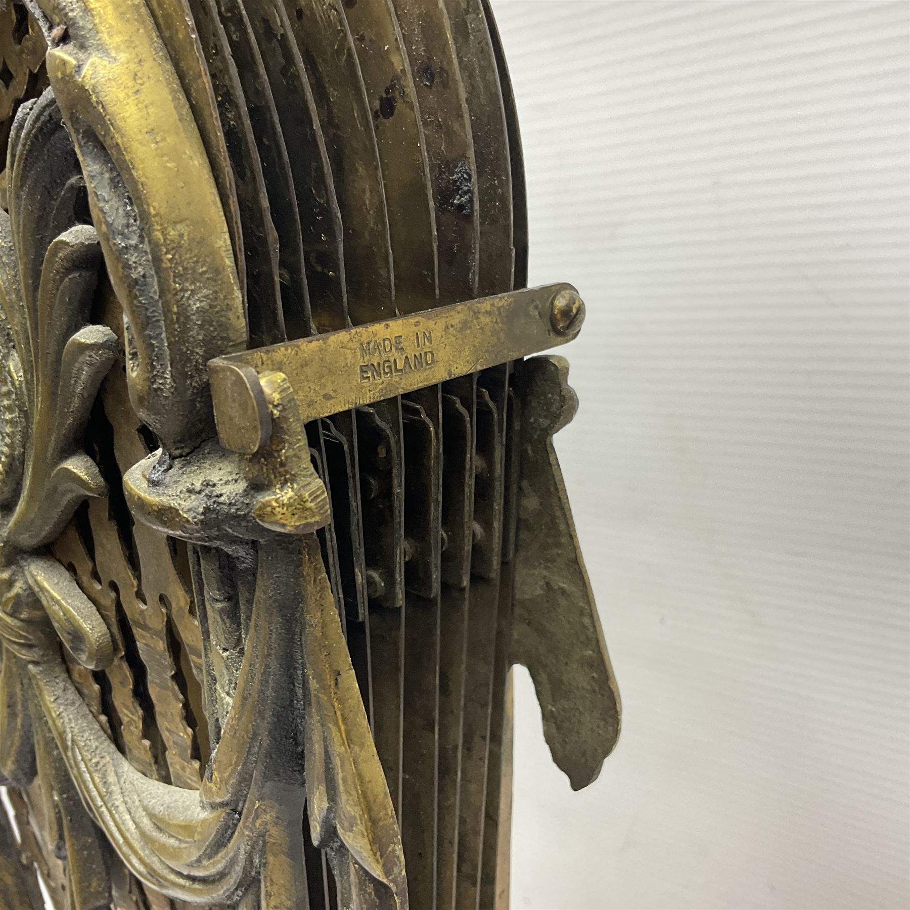 Pierced brass peacock style folding fire screen, with urn finial, H65.5cm