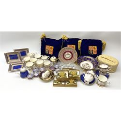 Commemorative ware Including five green and gold Highgrove limited edition hand embroidered tree decoration, a collection of ceramic ware from the royal collection including four cups and saucers, small teapot,    three trinket trays, five trinket pots with lids, eight tot glasses, three William Edwards Queens 80th cup, Hudson & Middleton hinged box etc. 