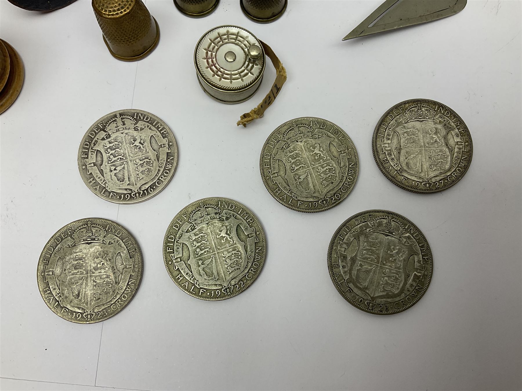 14ct gold coral stick pin, together with six pre-1947 silver halfcrown coins, silver napkin ring, silver mounted pen and other collectables