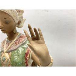 Lladro figure, Thai Dancer, modelled as a dancer kneeling, sculpted by  Vincente Martinez, no 2069, with original box, year issued 1977, year retired 1999, H45cm 