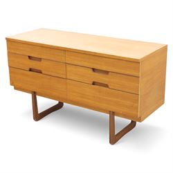 Uniflex - Mid 20th century teak sideboard, rectangular top over six drawers with recessed finger pulls, raised on U-shaped teak supports