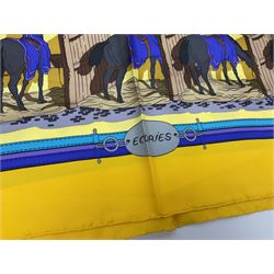 Hermès 'Ecuries' silk scarf, designed by Hugo Grygkar in 1947, printed with twenty horses in their respective stables, on yellow ground contained within stitched effect blue and purple and darker yellow gold borders, with rolled hand stitched edges and Hermes material label, 87cm square