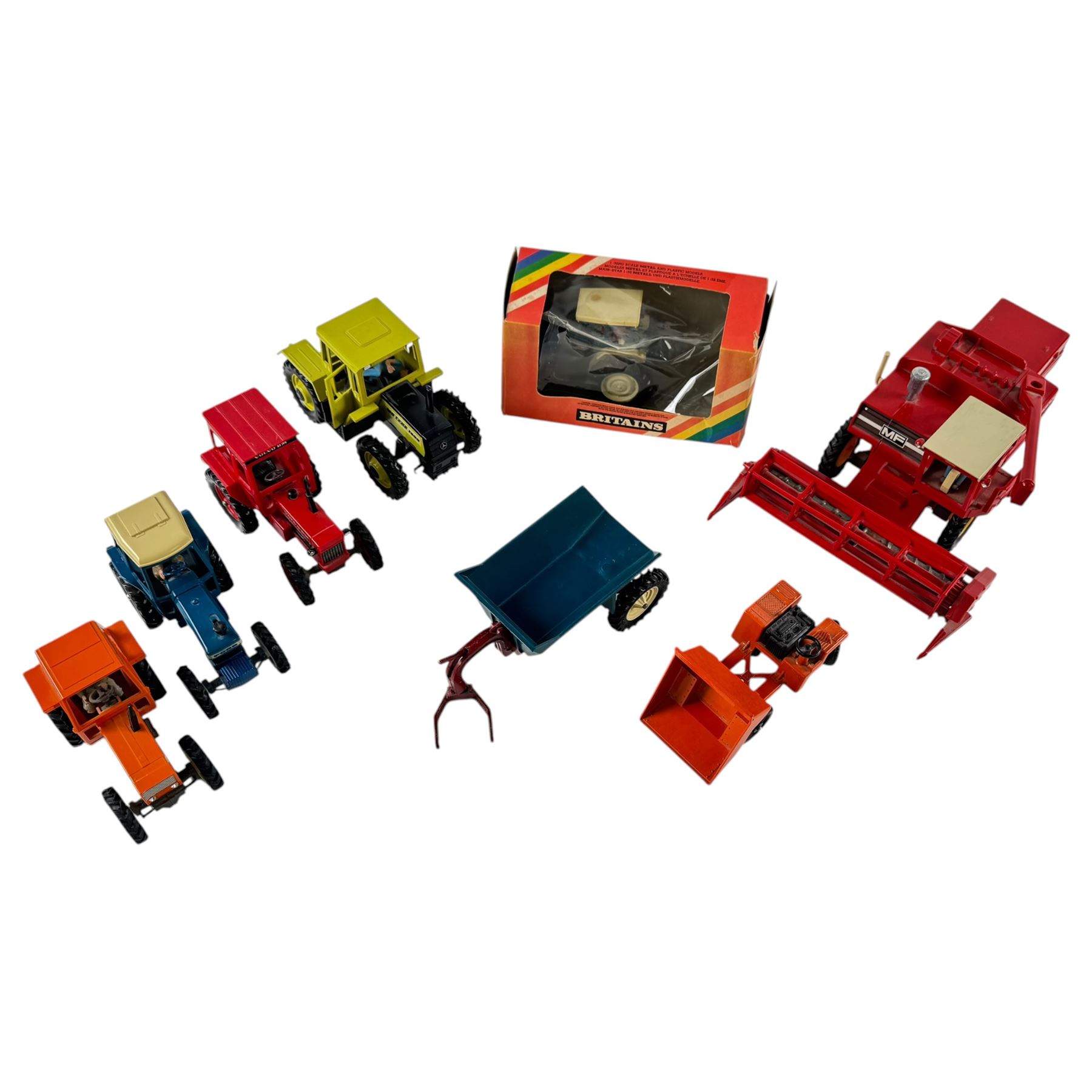 Britians Ltd tractors, including Ford TW20, boxed and loose Ford TW-20, Fiat 880 DT, MB Teac 1500, Volvo BM, a MF 760 Combine Harvester, Rear Dump and a Lonestar dumper truck
