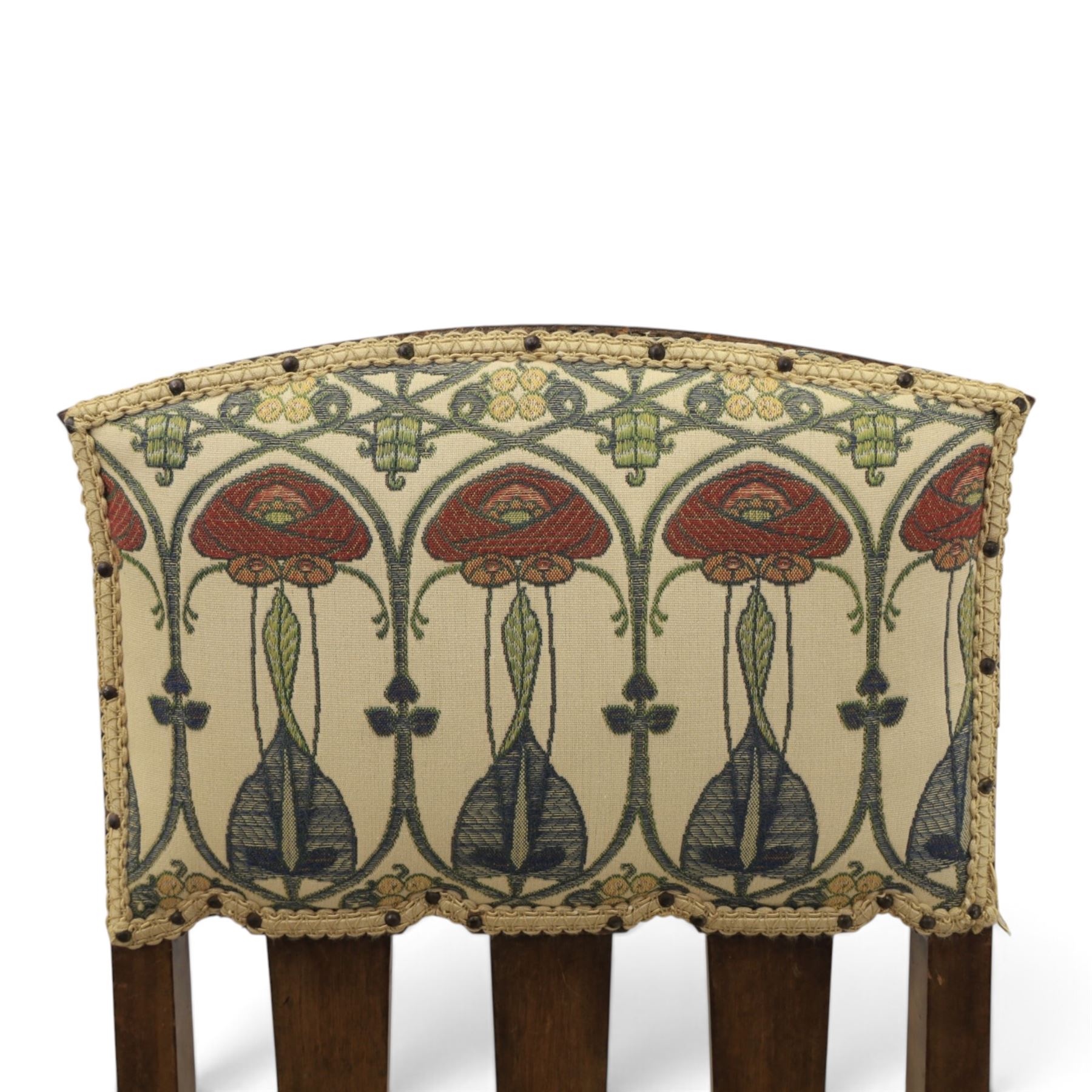 Robson & Sons, Newcastle on Tyne - Arts & Crafts high back armchair, upholstered in Mackintosh style fabric, shaped armrests and cylindrical supports united by stretchers