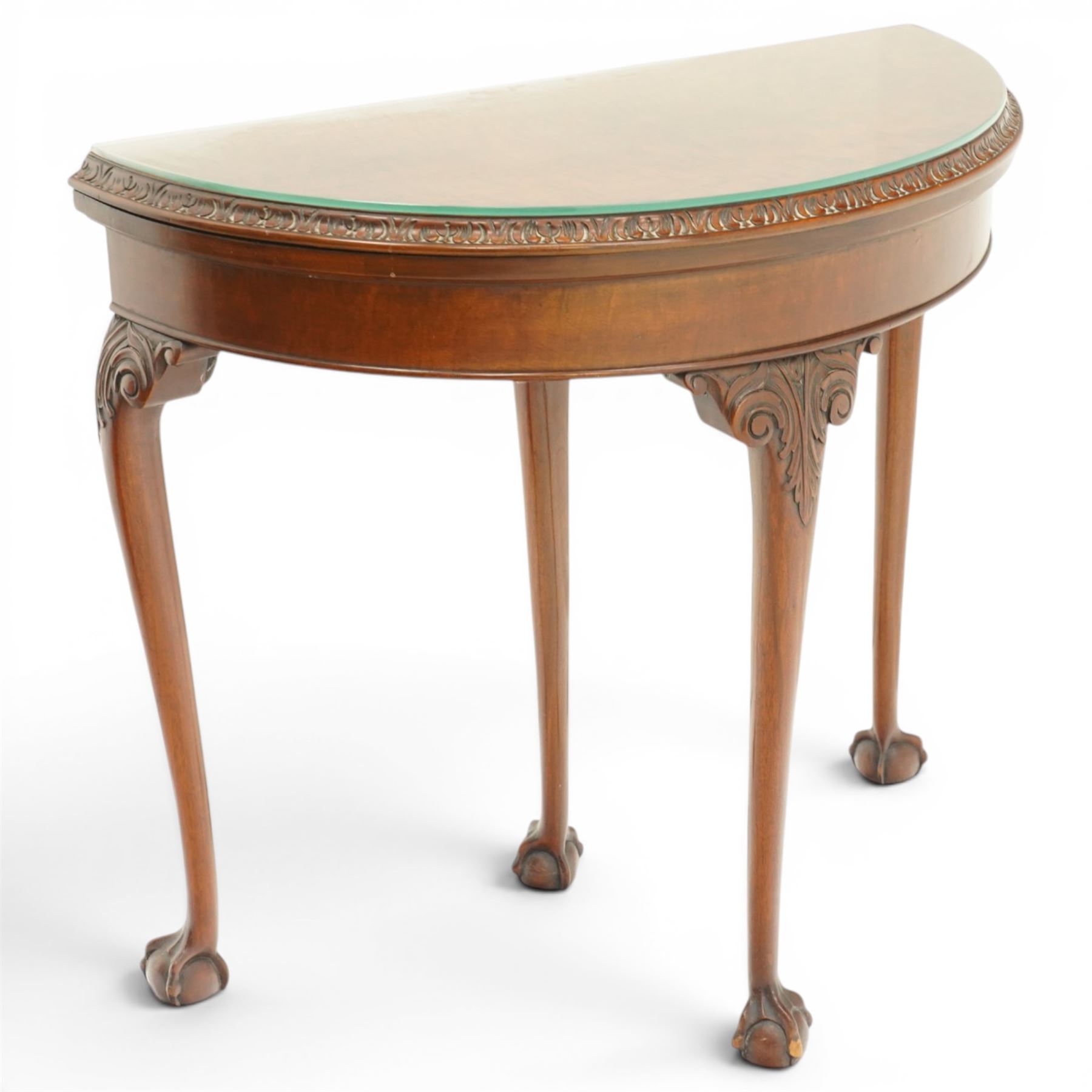 Leemings of Halifax - Georgian design mahogany demi-lune card table, the lunette fold-over top with carved edge and bevelled interior, raised on cabriole supports with acanthus carved knees, with draw-action rear support, terminating to ball-and-claw feet, makers plaque to rear