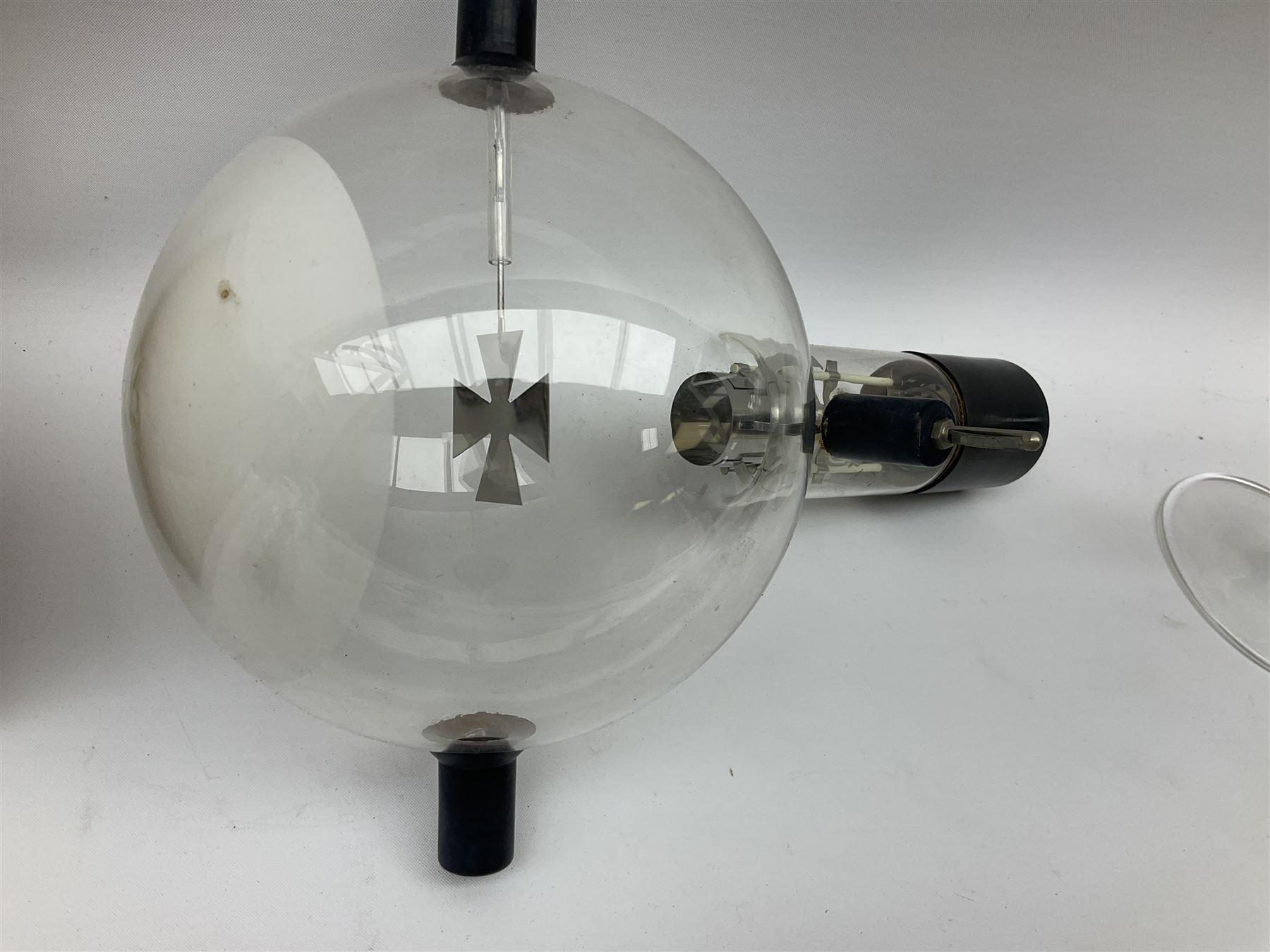 Quantity of laboratory and physics glassware including 'Guinea and Feather' equipment; boxed Latent Heat apparatus; Maltese Cross tube; atmospheric air pressure indicator flask; electroscope discharge tubes etc