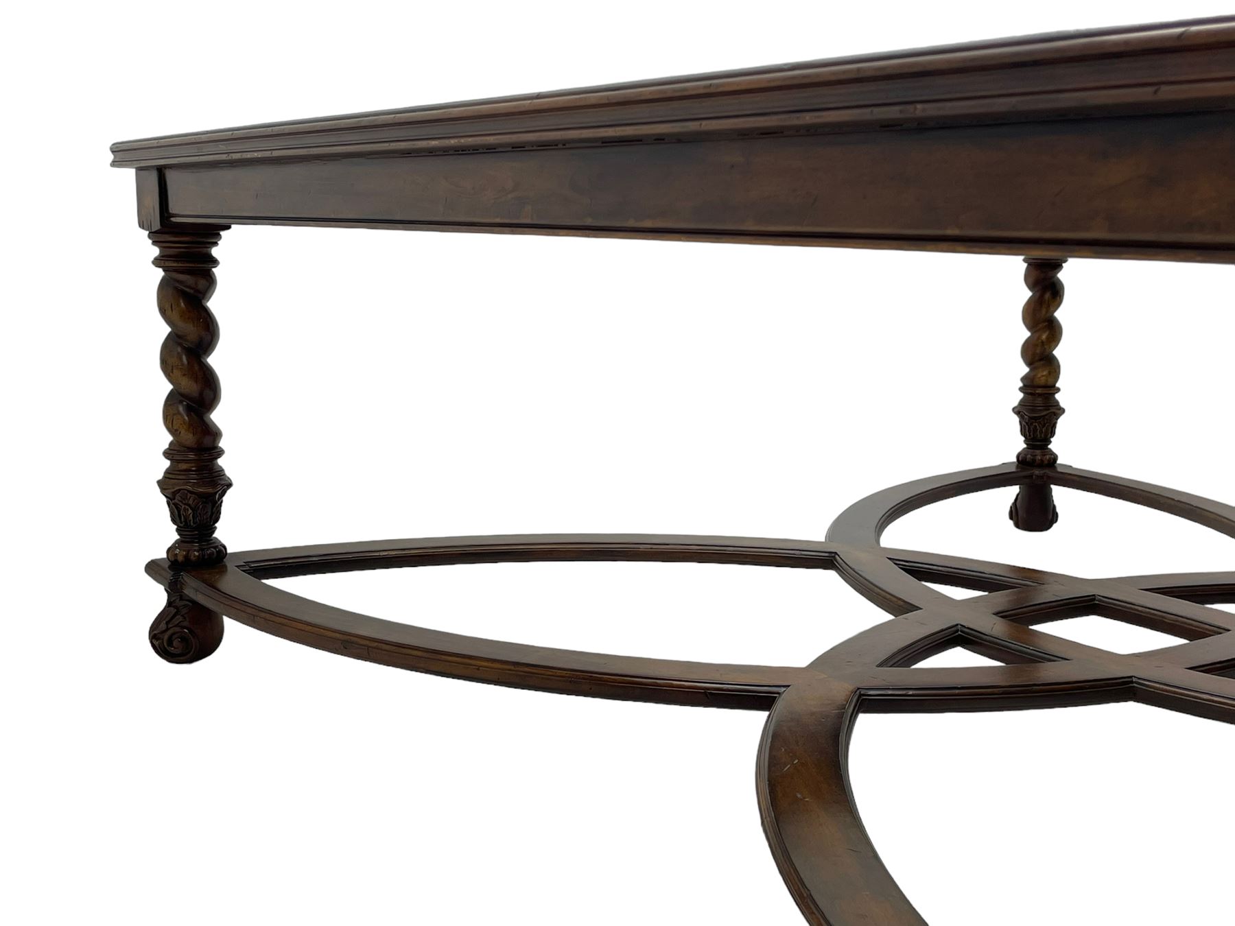 Jonathan Charles - large mahogany coffee table, the square oyster veneered top with verre églomisé inset, the glass hand-painted with gilt scrolling foliate patterns, raised on spiral turned supports with acanthus and gadroon carvings, united by interlocking demi-lune stretchers, on scrolled acanthus feet