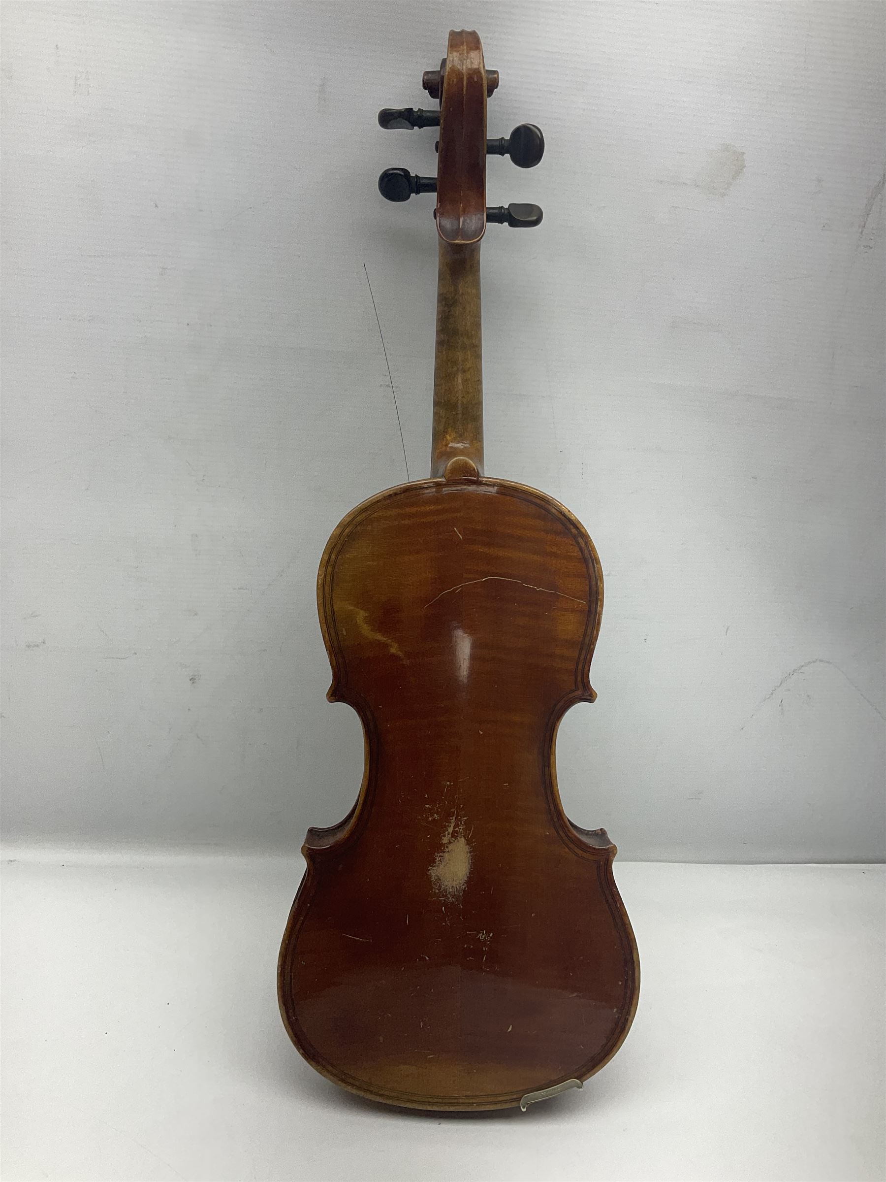 German copy of a Maggini violin c1900 with 35.5cm two-piece maple back and ribs and spruce top, bears label 'Maggini Deutsche Arbeit 1866' L59cm; in carrying case with bow