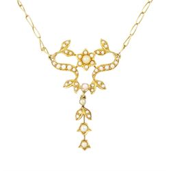 Edwardian gold split pearl pendant necklace, openwork floral pendant set with split pearls...