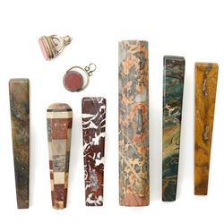Collection of ten 19th century agate knife handles of varying designs, paperweight of octagonal design, swivel fob seal and a pinchbeck seal