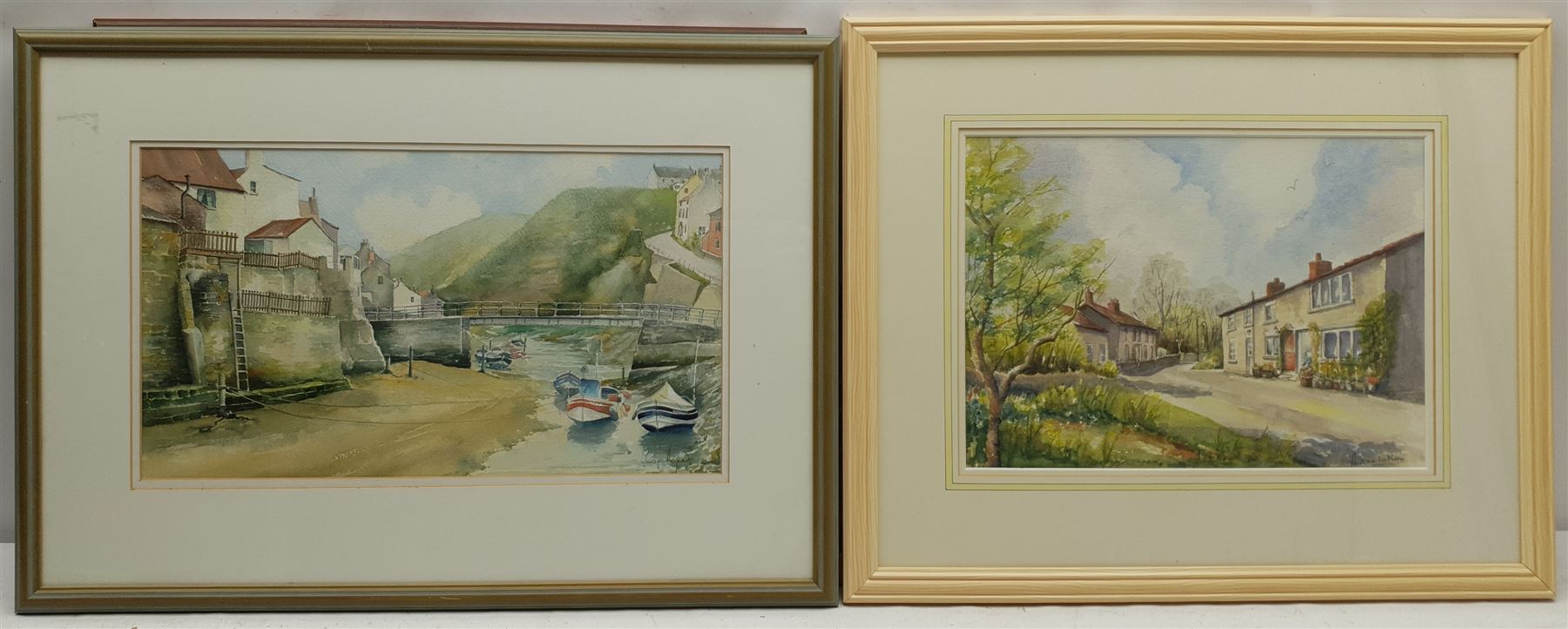 Don Micklethwaite (British 1936-): 'Omaha Beach Normandy', watercolour signed, titled and dated 2003 verso; David Kirby (British Contemporary): 'The Landing at Robin Hood's Bay', oil on board signed, titled and dated 2004 verso; Percy Hope (British 20th century): 'Staithes Beck', watercolour signed '99; Pauline Latham (British 20th century): Cottages on Hall Garth Lane West Ayton, watercolour signed, max 24cm x 43cm (4)