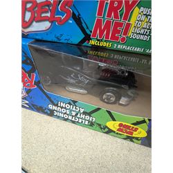 Collection of wrestler figures, two WCW Road Rebels vehicles and a collection of accessories