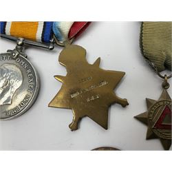 Made-up group of three WWI medals comprising 1914 Star awarded to 23598 Gnr. F. Jefferson R.G.A., British War Medal and Victory Medal with names removed; with ribbons on wearing bar; 1942 Motorist's Medal and small quantity of cap badges, Royalty badges etc