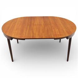 Frem Røjle - Danish teak 'Roundette' extendable dining table, circular top with softly chamfered edge and internal stowable leaf extends to 156cm, raised on four tapered cylindrical legs, accompanied by four matching dining chairs with shaped teak frames and black vinyl upholstered seats, the chairs designed to nest beneath the table when not in use