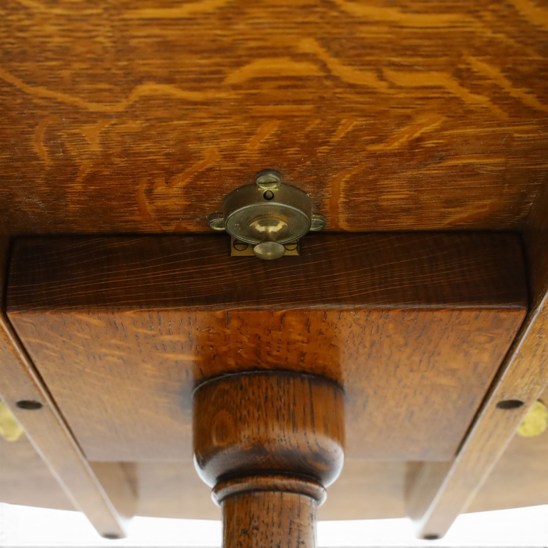 Traditional design golden oak tilt-top tripod table, brass fittings, turned baluster column on splayed supports