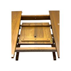Ercol - late 20th century oak refectory dining table, rectangular top with rounded corners and central extending leaf, raised on turned baluster supports united by a stretcher (Extended 200cm)