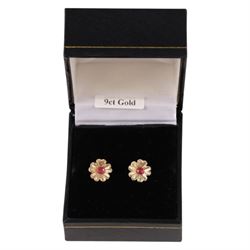 Pair of 9ct gold and ruby flower stud earrings, boxed