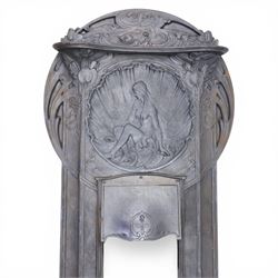 Art Nouveau cast iron fireplace, shaped hood with scrolling foliate crest, relief cast panel of female figure seated within shell form amidst wave motifs, uprights cast with foliate designs