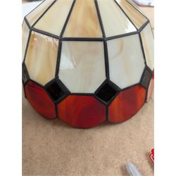 Two Tiffany style domed lampshades, together with a circular glass shade with stained glass decoration, largest H15cm, D30cm