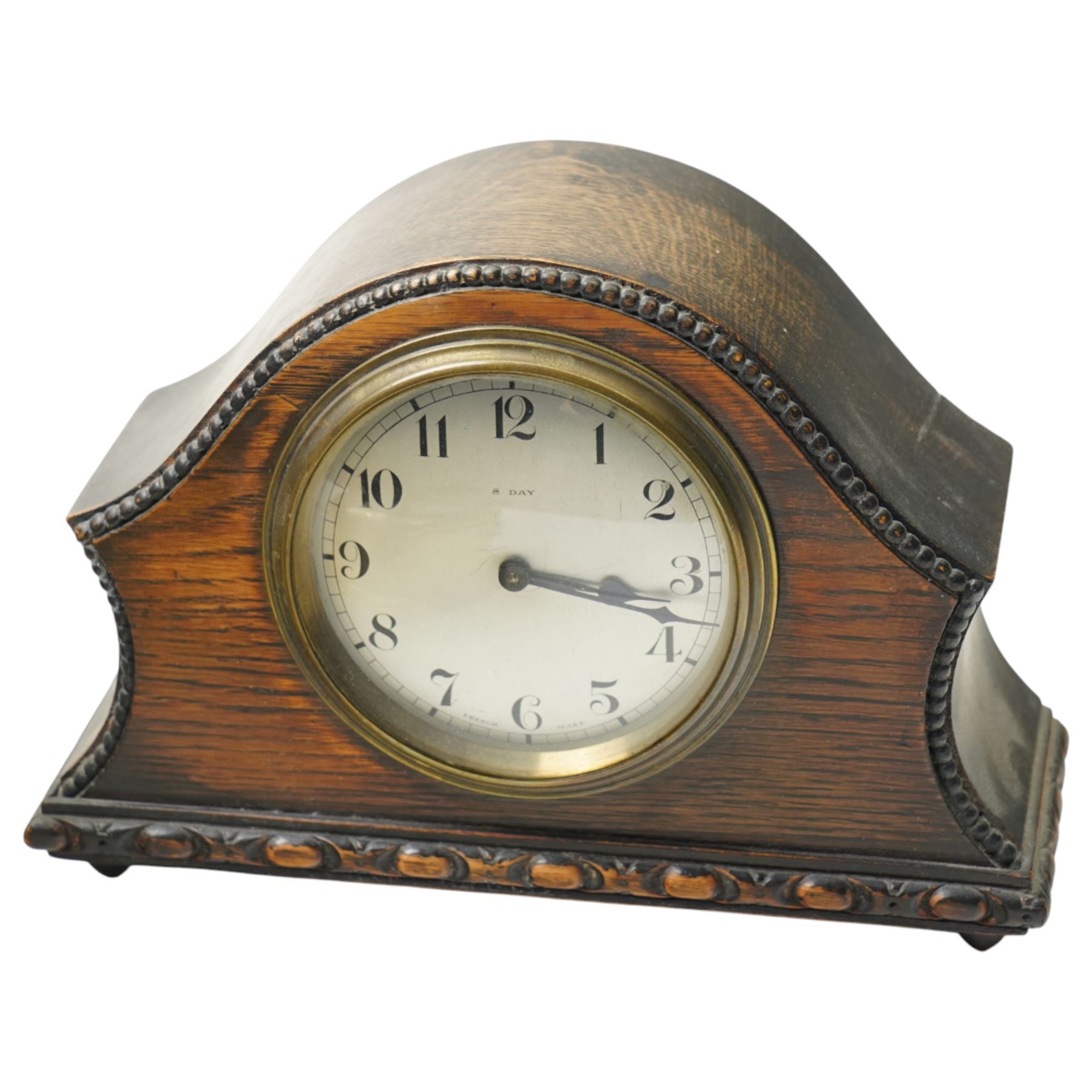 Three 20th century 8-day spring driven mantle clocks and a 20th century brass cased ships clock with a sweep seconds hand.