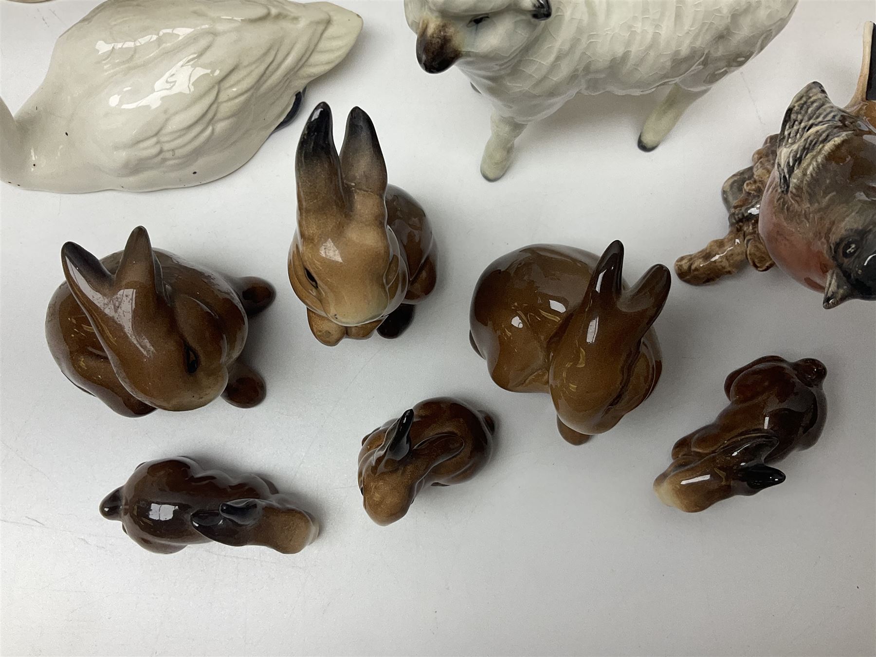 Group of Beswick figures to include leopard no 1082, rabbits, swan, pheasant no 1226 etc, all with marks beneath