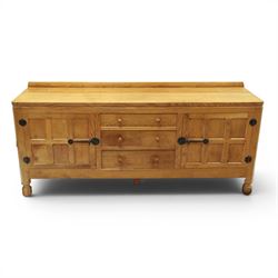 Mouseman - large adzed light oak sideboard, the rectangular top with raised galleried back...