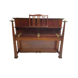 Carl Bechstein - late 19th century German overstrung upright piano, in a model 4 Arts and Crafts case designed by Walter Cave, with a lattice music desk and fretted silk backed front panel, brass hinged case lid and key fall with square tapered candle holders and circular sconces, iron frame, serial number 52187 (1899-1900), with an under damper action, 85 ebony and ivory keys, sustain and una corda pedals, original action, stringing, dampers, and action return straps, registered case number 328639, USA patent 24805.

This item has been registered for sale under Section 10 of the APHA Ivory Act