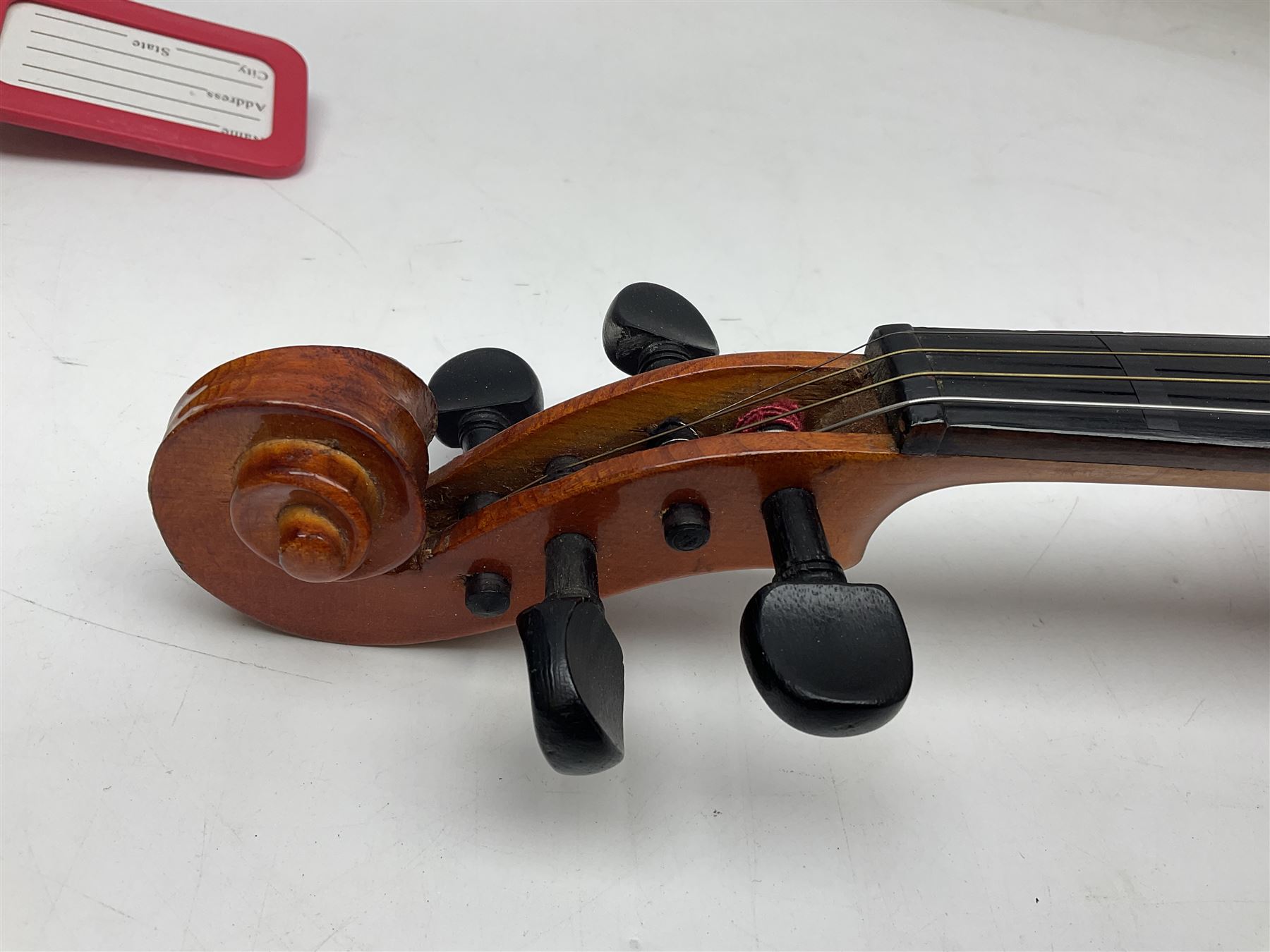 Four student violins - two Chinese three-quarter size with 33.5cm and 34cm two-piece backs; Stringers of Edinburgh quarter size with 28cm two-piece back; and Stentor quarter size with 28cm two-piece back; each in carrying case (4)